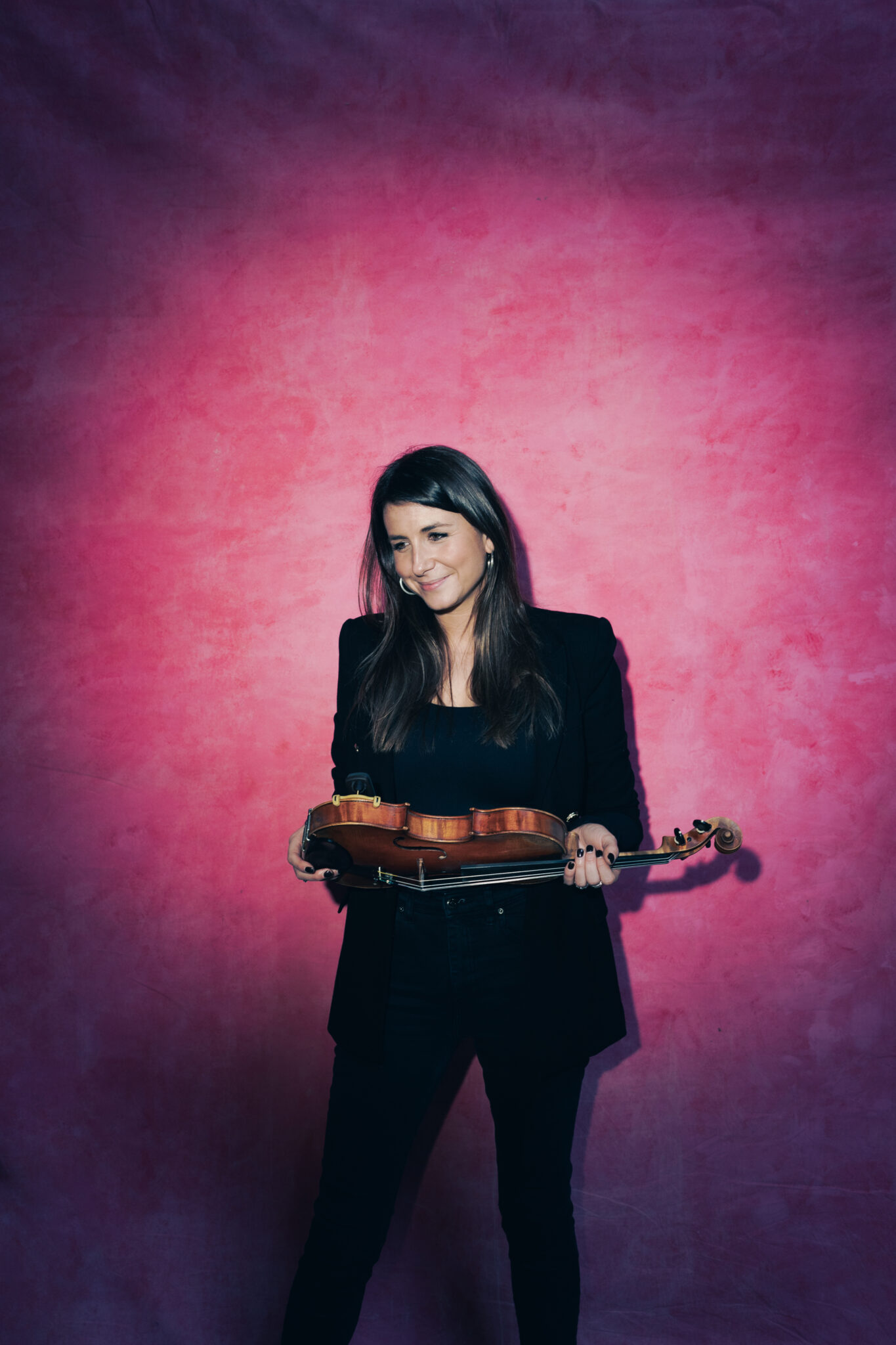 Rachel Cooper holding violin