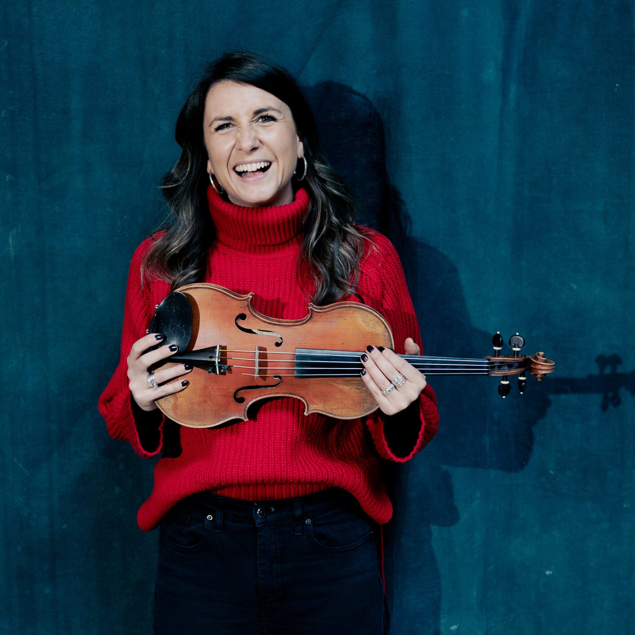 Rachel Cooper holding violin